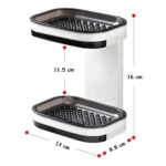 Jabonera de doble nivel con drenaje, repisa y medidas de 16x13x8.8 cm.