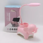 Lámpara flexible en forma de elefante rosa para escritorio, con portalápices y soporte para celular.