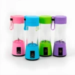 Mini batidora USB portátil de 6 cuchillas en colores vibrantes: rosado, azul, verde y morado.