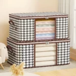 Organizador de sábanas y cobijas apilables con ventana transparente y diseño de pata de gallo.