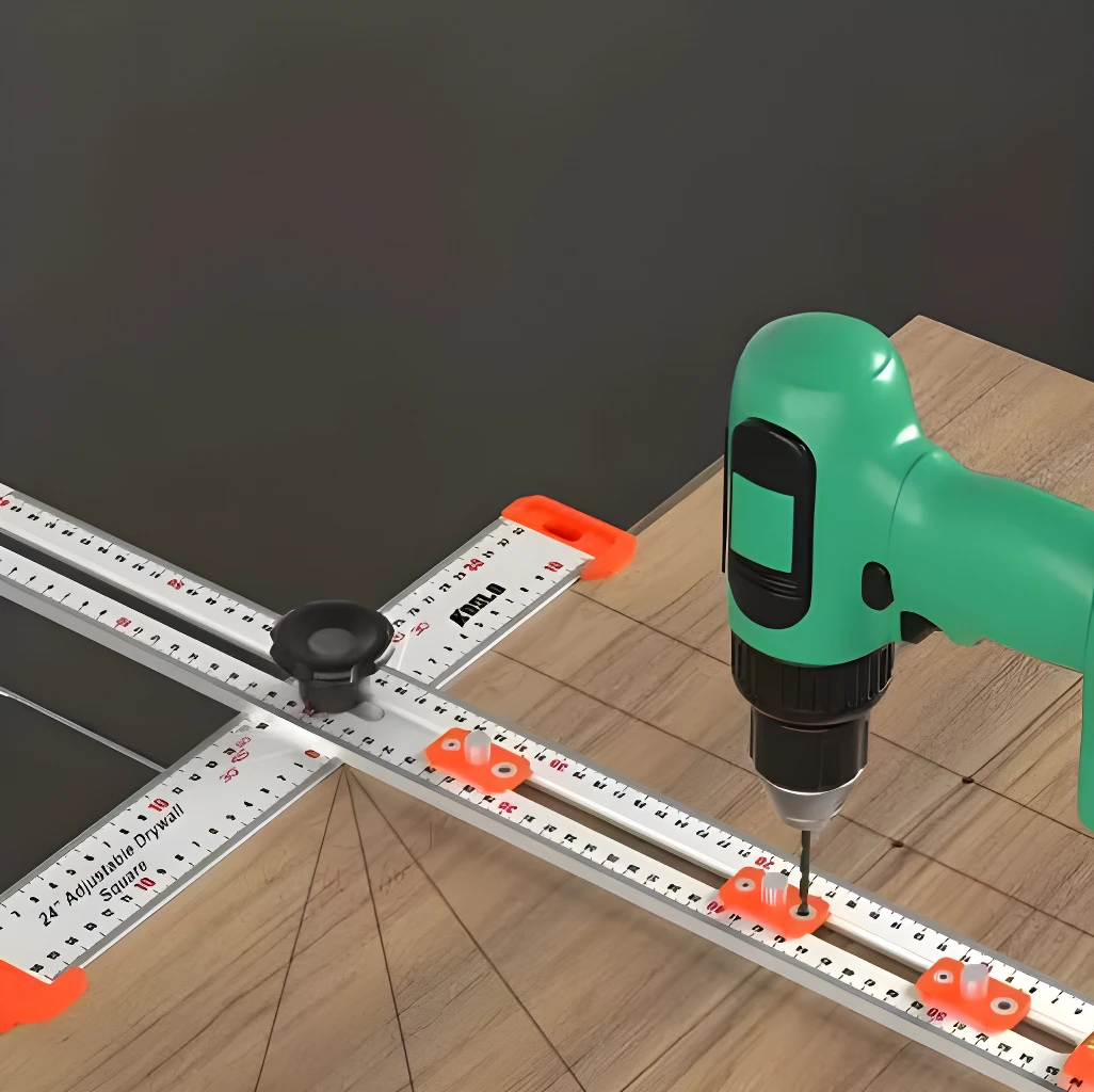 Regla de posicionamiento y perforación de 24 pulgadas con taladro verde sobre superficie de madera.