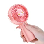 Ventilador de mano portátil rosa con diseño de oso, ideal para refrescar en cualquier lugar.