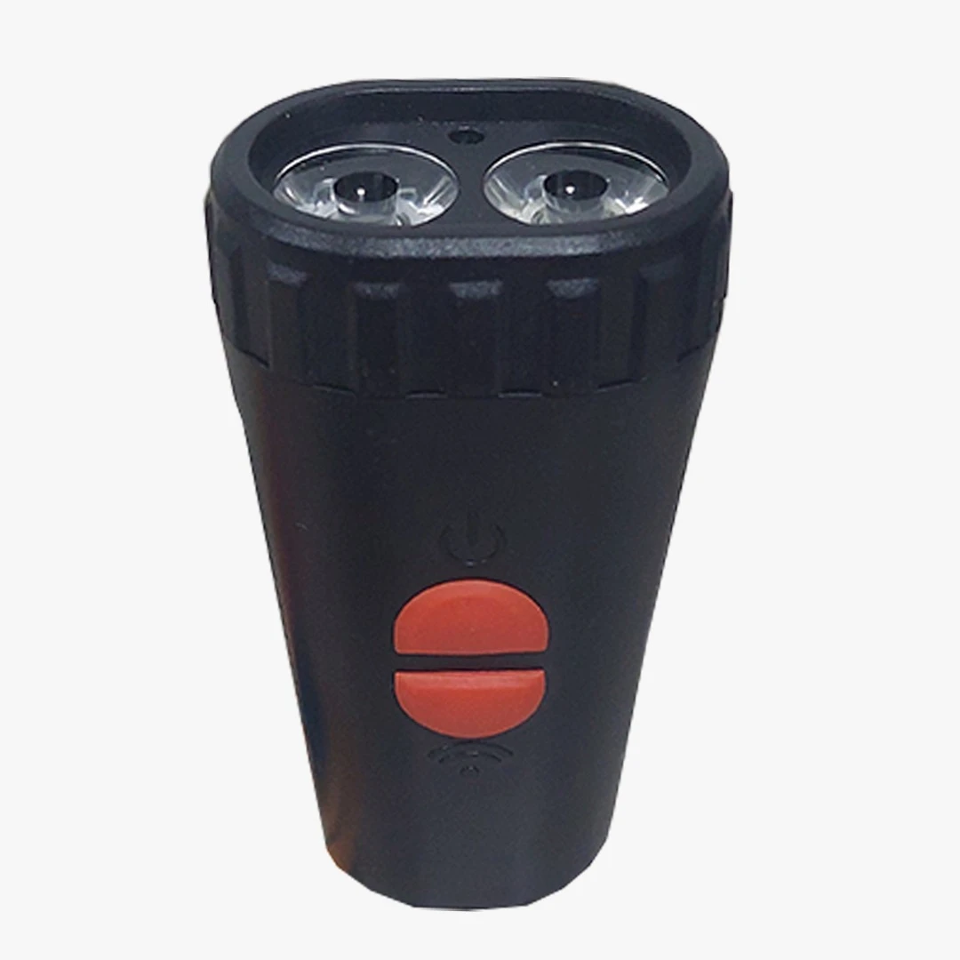 Linterna LED negra para bicicleta con pito y doble foco.