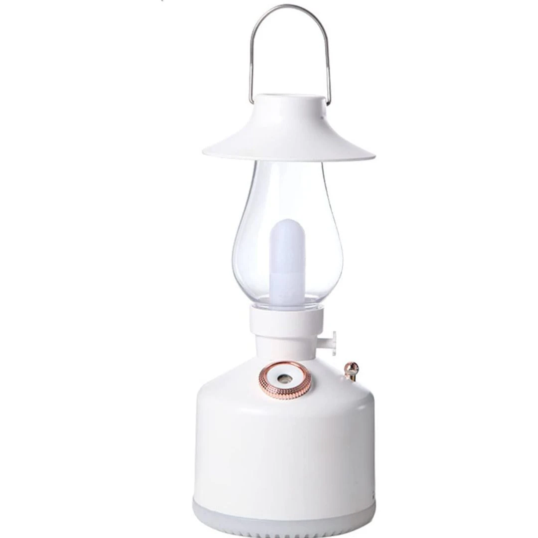 Linterna LED de camping humificadora blanca con diseño vintage y luz cálida.