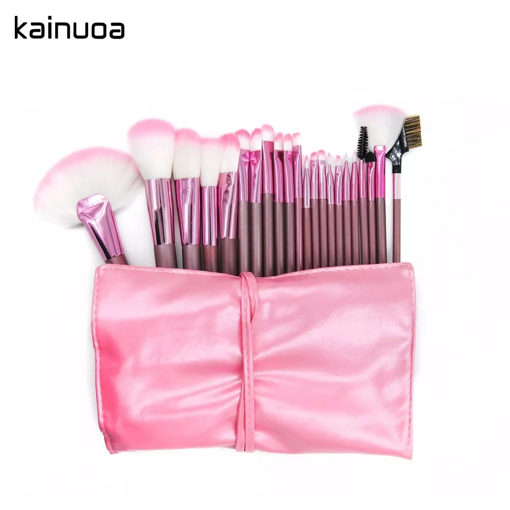 Juego de brochas de maquillaje profesional KAINUOA en estuche rosa plegable.