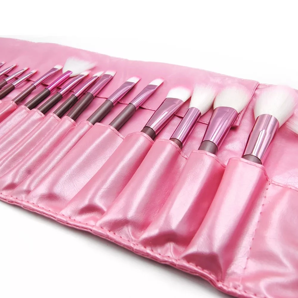 Juego de brochas de maquillaje rosadas con estuche, set completo para belleza.