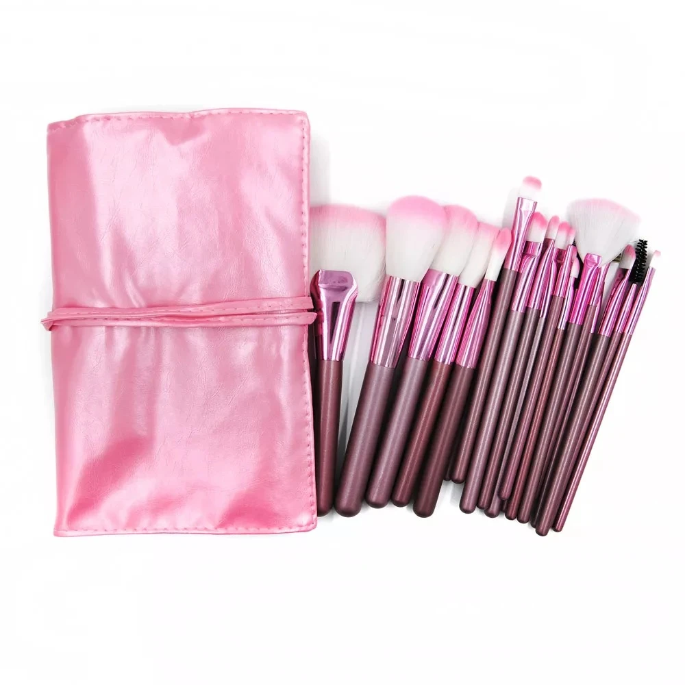 Juego de brochas de maquillaje rosa con estuche, ideal para belleza y aplicación de cosméticos.