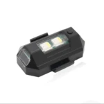 Luz trasera intermitente para bicicleta, LED blanco, negro, compacto y versátil.