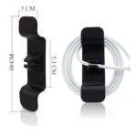 Gancho adhesivo organizador de cables, negro, ideal para cargar dispositivos.