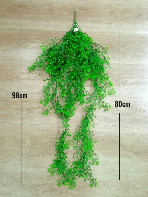 Racimo colgante artificial de hojas verdes, mide 98cm x 80cm.