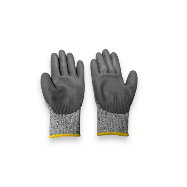 Guantes anticorte protección Ga2017, grises, con puño reforzado amarillo, par.