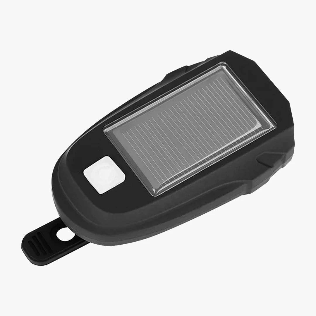 Luz para bicicleta con panel solar 218, diseño compacto y negro.