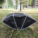 Organizador negro plegable para carro o camping, ideal para exteriores.