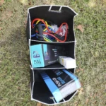 Organizador de carro o camping con bandas de resistencia, pull reducer y push up board.