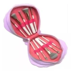 Set de brochas de maquillaje con estuche lila en forma de concha, ideal para viaje.