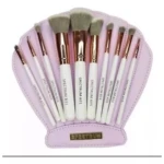 Set de brochas de maquillaje Spectrum en estuche de concha, incluye 10 brochas de diferentes tamaños y formas.
