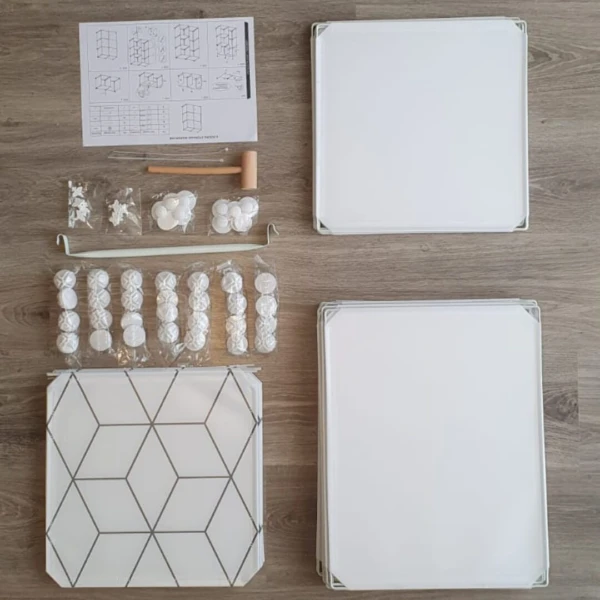 Armario organizador de 6 módulos blanco, piezas de ensamblaje, martillo y manual.