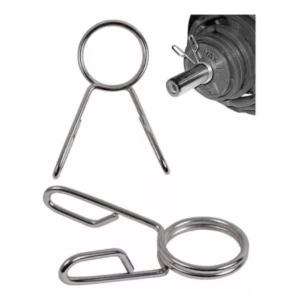 Seguros para barra olímpica profesional plateados x2 en detalle y puestos en disco.