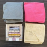 Organizador de cajones para ropa interior, lencería y calcetines en colores gris, rosa y beige.