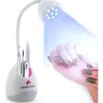 Lámpara UV LED profesional para uñas con set de manicura, secado rápido y diseño moderno.