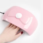 Lámpara de uñas 48W con diseño de moño, ideal para secado rápido de esmalte.