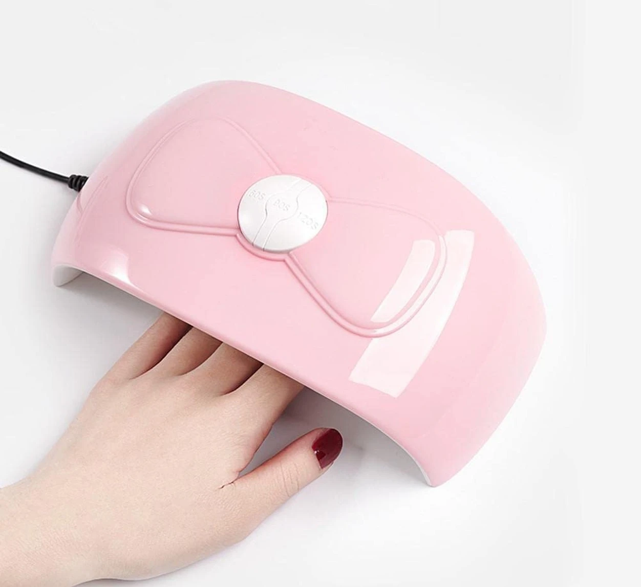 Lámpara de uñas 48W con diseño de moño, ideal para secado rápido de esmalte.