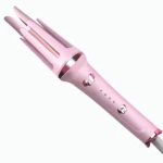 Rizador y cepillo alisador rosa para cabello, con diseño de pétalos y controles.