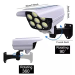 Lámpara solar de seguridad falsa con cámara giratoria 360° y sensor de movimiento.