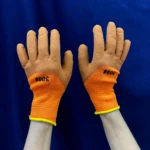 Guantes de trabajo GP-300 naranjas con puño elástico, aptos para protección.