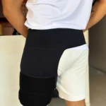 Soporte para pierna contra ciática: banda negra de compresión para alivio del dolor.