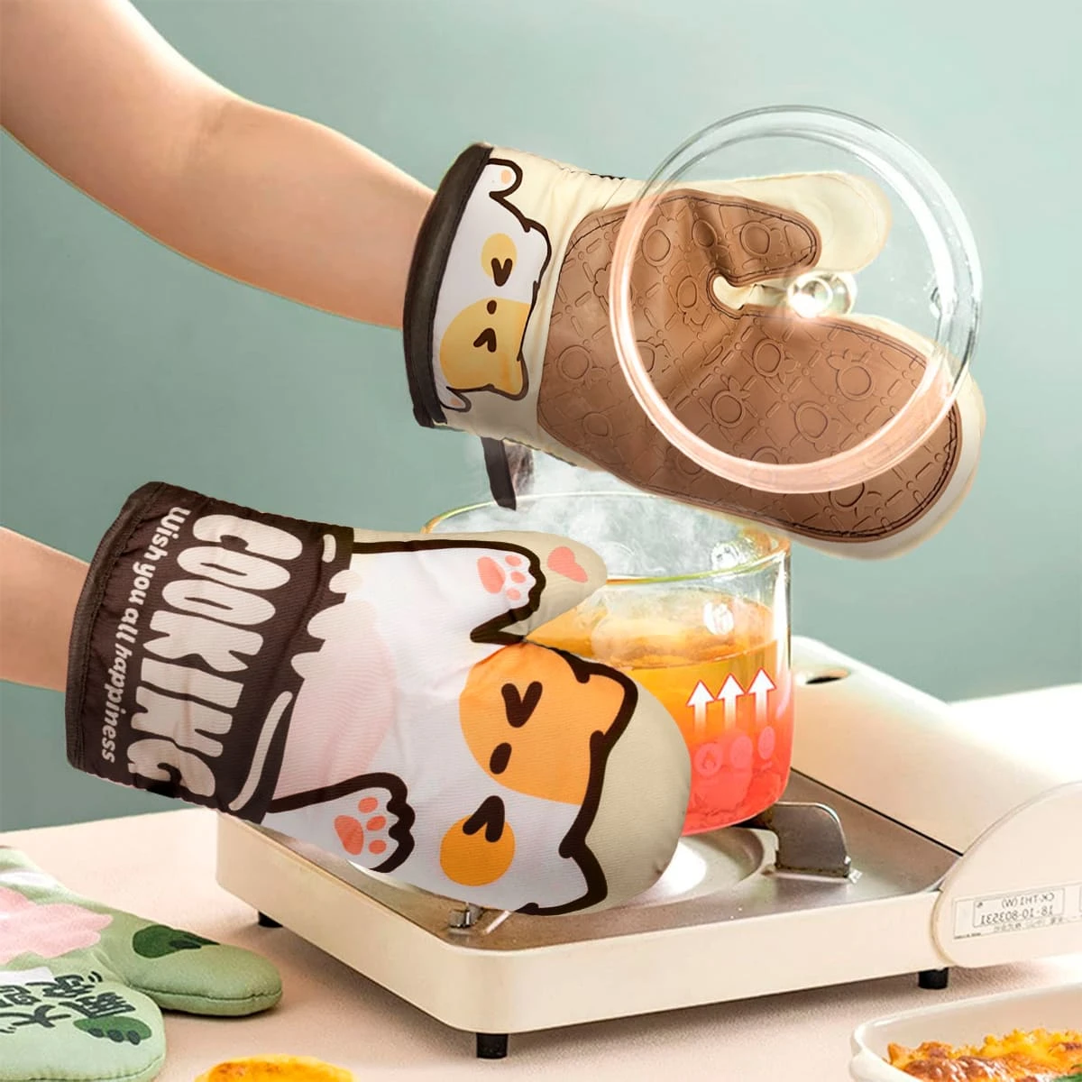 Guantes para hornear de silicona con diseño de perro, ideales para cocina.