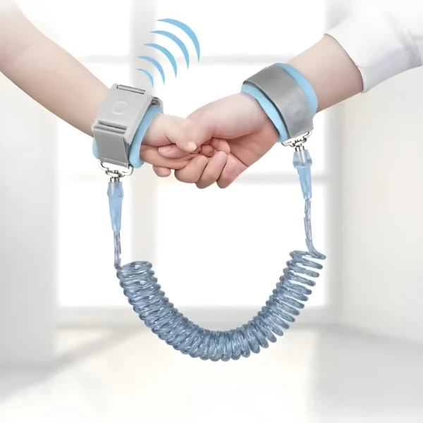 Arnés muñequera anti-pérdida para niños, conecta muñecas con cordón retráctil seguro.