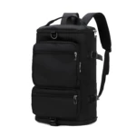 Bolso Morral Nry negro, diseño moderno con múltiples bolsillos y correas ajustables.