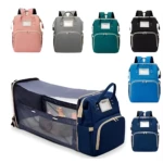 Bolso pañalera con cuna y cambiador para bebé, disponible en varios colores y estilos.