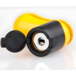 Candado de freno de disco amarillo y negro para moto, con tapa abierta mostrando el cilindro de la cerradura.