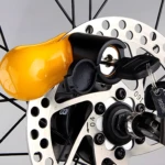 Candado de freno de disco amarillo y negro para moto, antirrobo con llave.