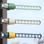 Colgador de ropa multifunción para marco de ventana, diseño con 9 agujeros para secar, color verde.