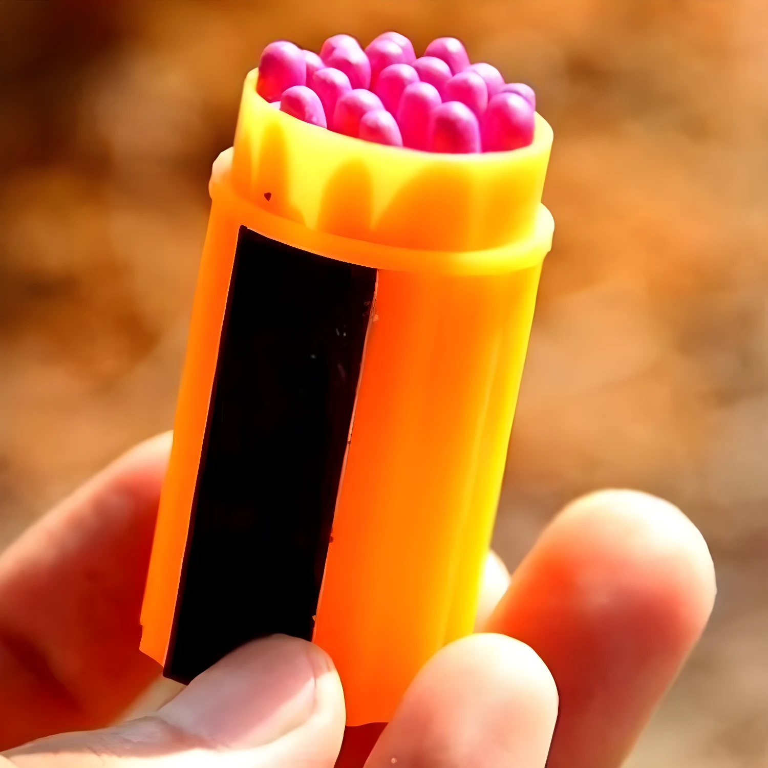 Fósforos impermeables para camping, 20 unidades en envase naranja.