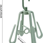 Colgador de zapatos verde con medidas indicadas, gancho para secar ropa.