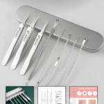 Kit removedor de espinillas X8 en acero inoxidable, ideal para limpieza facial profunda.