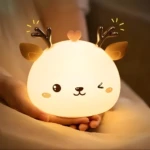 Lámpara de silicona de reno con diseño tierno, luz cálida, ideal para niños.
