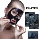 Mujer usa mascarilla negra Pilaten para eliminar puntos negros y barros de su rostro.