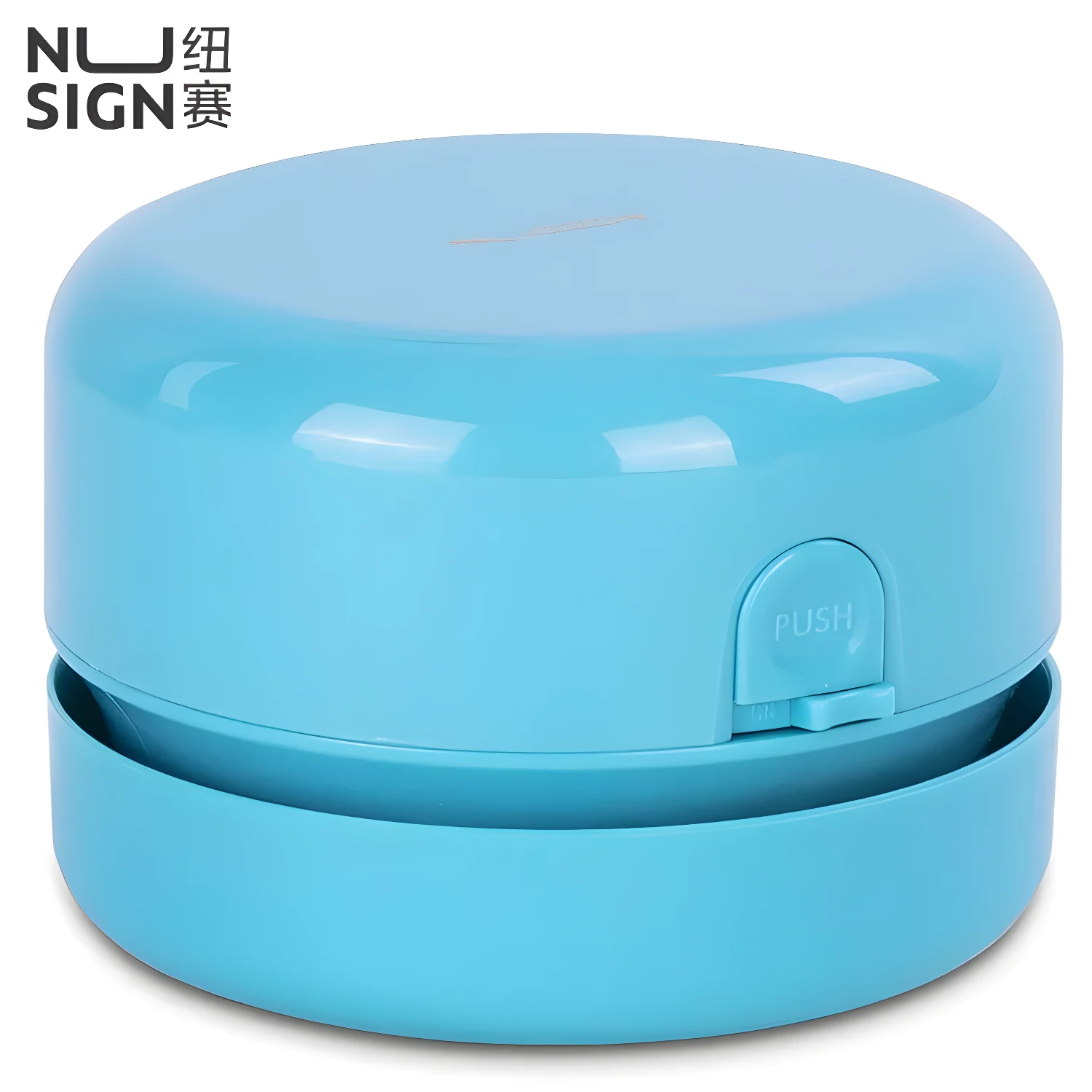 Mini aspiradora de escritorio inalámbrica azul con botón "PUSH" y logo NU SIGN.