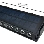 Mini lámpara solar con sensor, diseño negro y 7 focos LED, 16.1cm x 6cm.