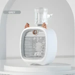 Mini ventilador refrigerador gris recargable con diseño de gatito y depósito de agua.