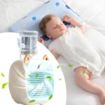 Mini ventilador refrigerador recargable con botella de agua, ideal para bebé durmiendo.
