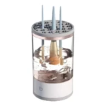 Minilavadora automática de brochas de maquillaje, limpiador eléctrico con recipiente de agua transparente.