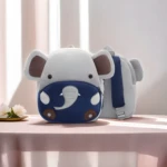 Mochila infantil de elefante azul con estampado de animales para niños.