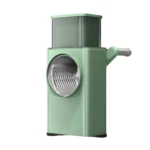 Molino de verduras cuadrado manual verde con manivela y tambor rallador.