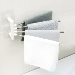 Organizador de toallas giratorio de pared con 4 barras para baño y cocina.